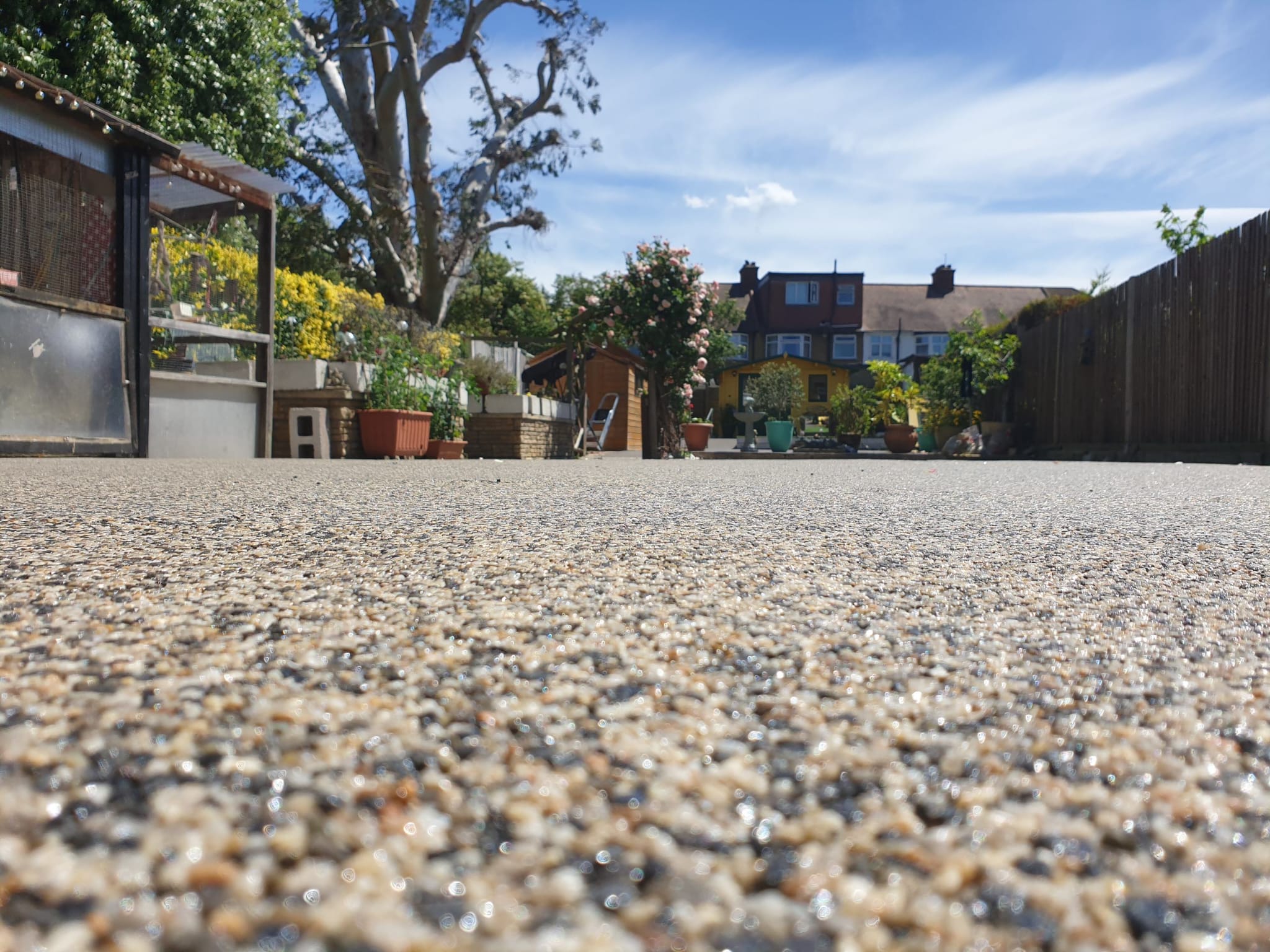 Professional resin bound driveway installation showing smooth aggregate finish